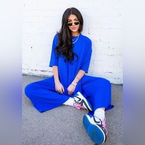 Dressed in Lala Lex Ribbed Playsuit in Royal Blue size SMALL